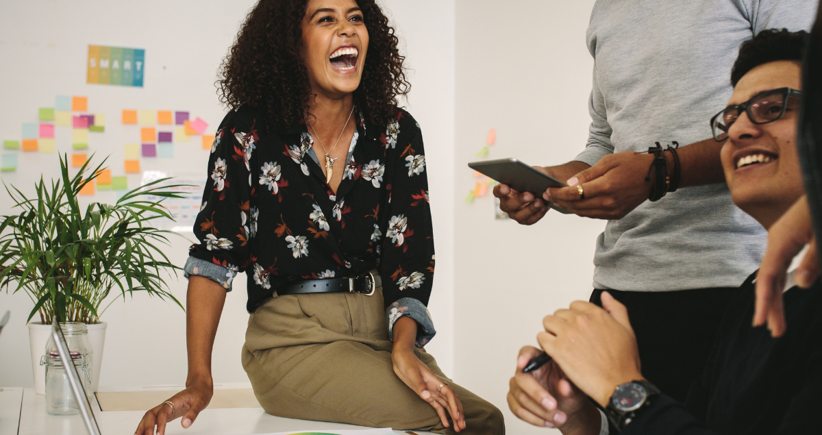 A woman planning corporate events with coworkers
