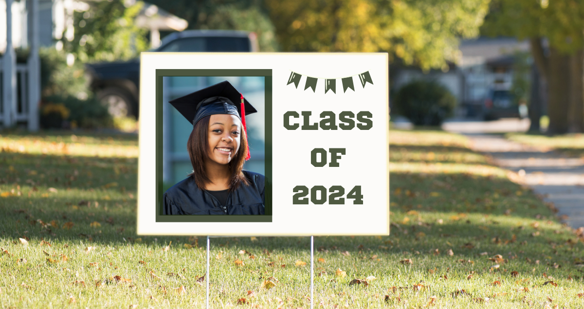 A yard sign with a picture of a graduate and the text, "Class of 2024"